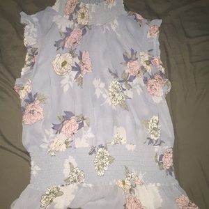 A flower shirt no sleeves. Halter top.